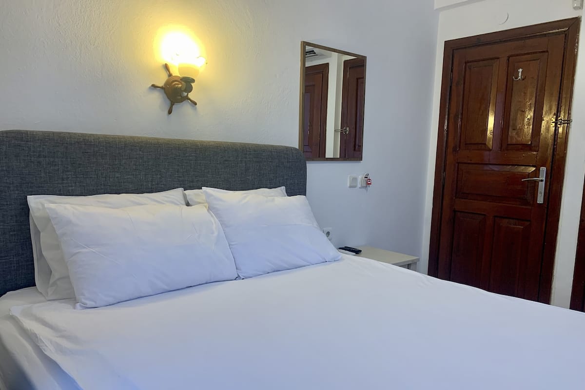 Camas con pillow-top, minibar, wifi gratis y ropa de cama