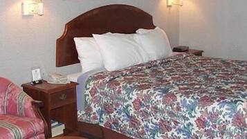 Desk, laptop workspace, blackout curtains, bed sheets