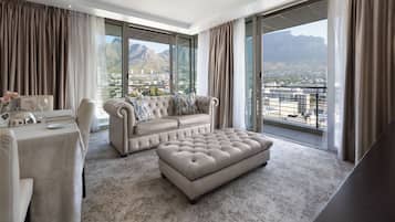 Executive Suite, 2 Bedrooms | Living area | 55-inch Smart TV with satellite channels
