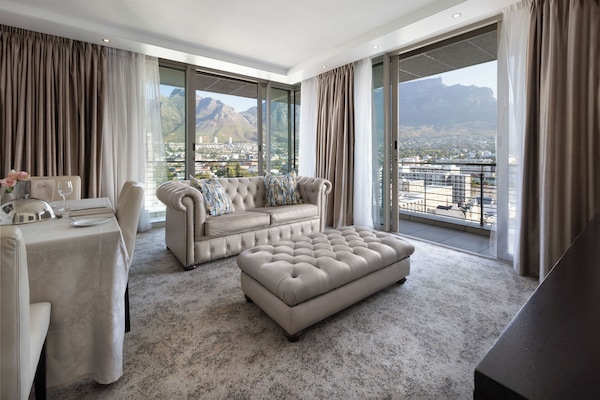 Executive Suite, 2 Bedrooms | Living area | 55-inch Smart TV with satellite channels