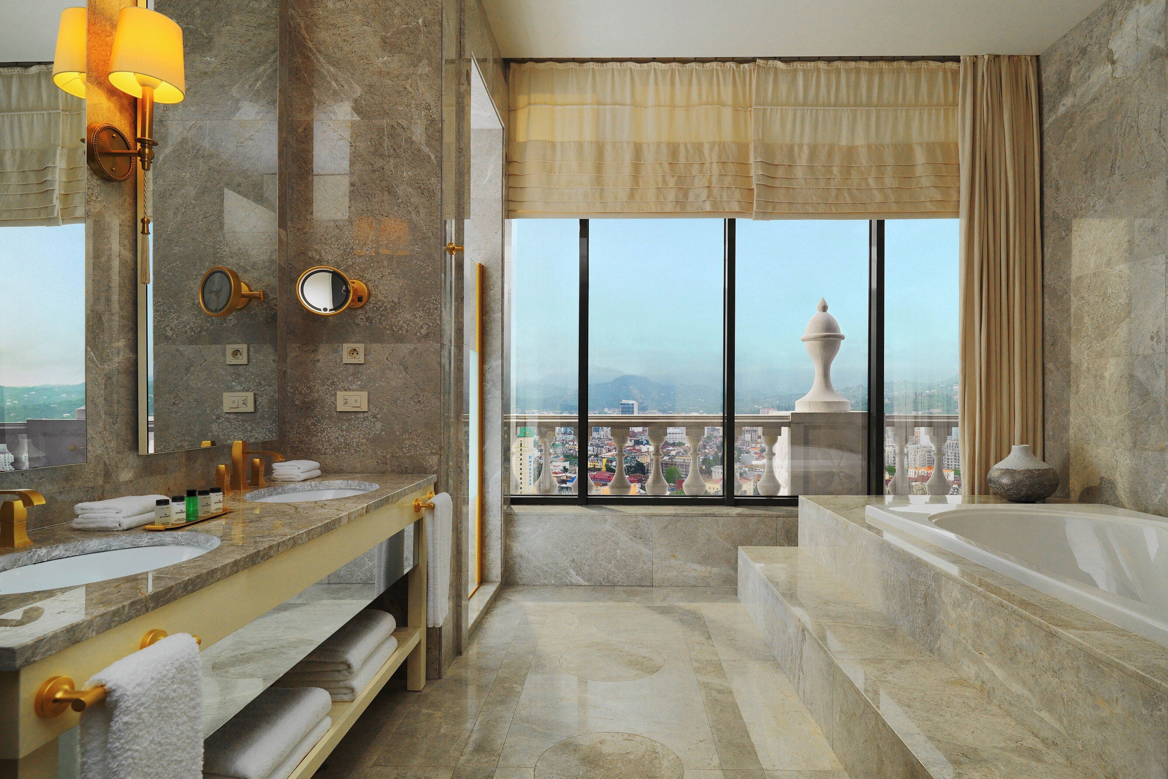 suite, 1 double bed, non smoking | bathroom | deep-soaking bathtub, hair dryer, slippers, towels