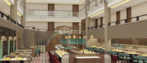 A modern hotel lobby with multiple dining areas, a central bar, and a staircase leading to upper floors.