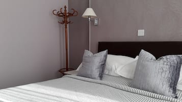 Ropa de cama de alta calidad y tabla de planchar con plancha