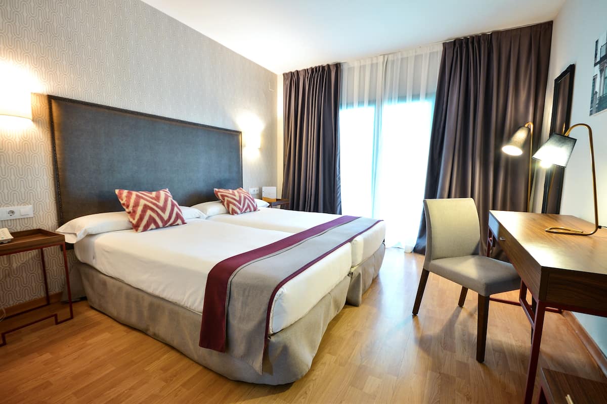 Premium bedding, down duvets, in-room safe, individually decorated