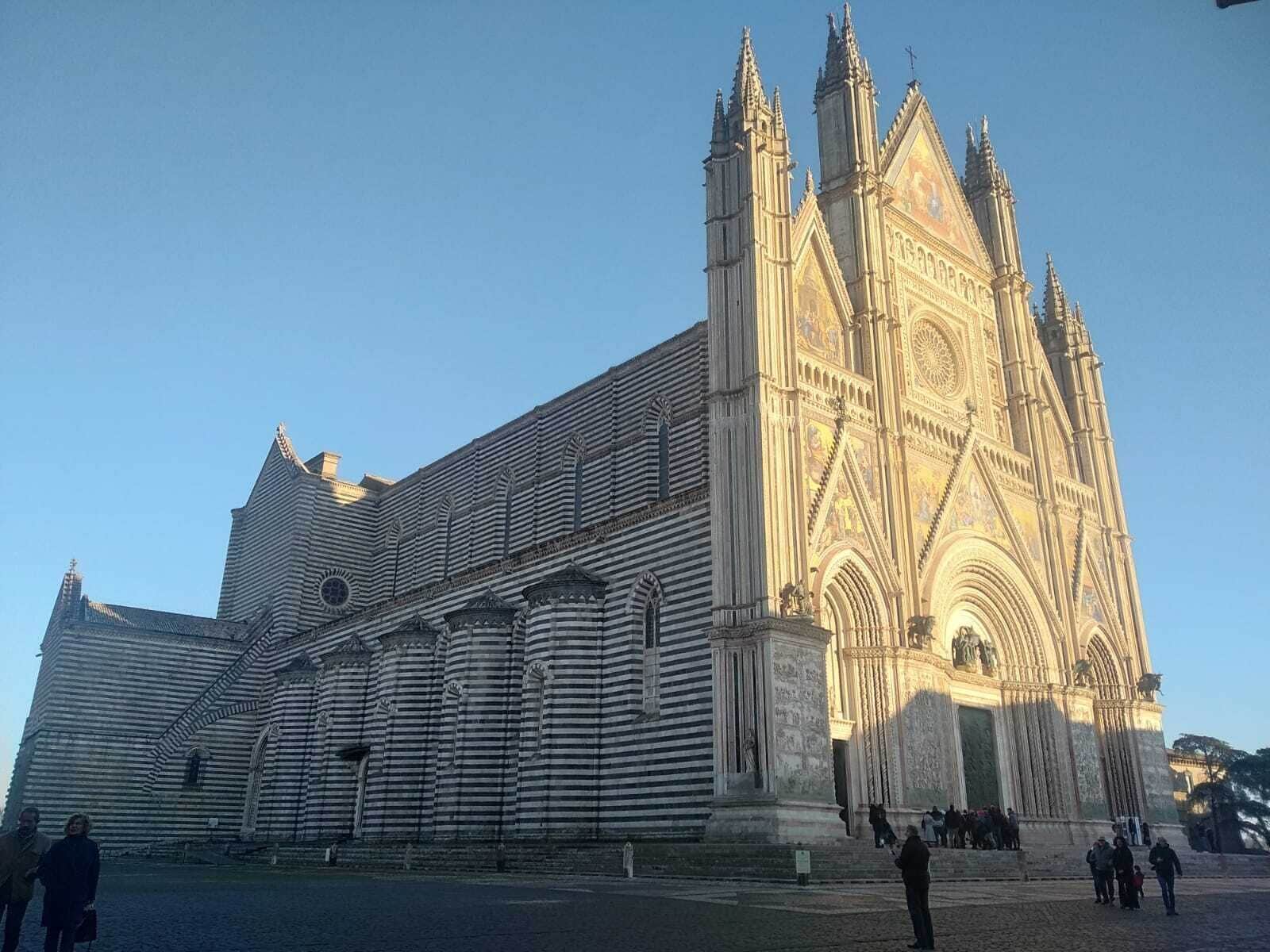 A large cathedral with a prominent facade, multiple towers, and a large central entrance.