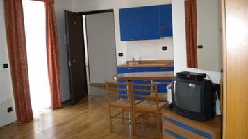 Apartment (3 Adults) | Living area | TV