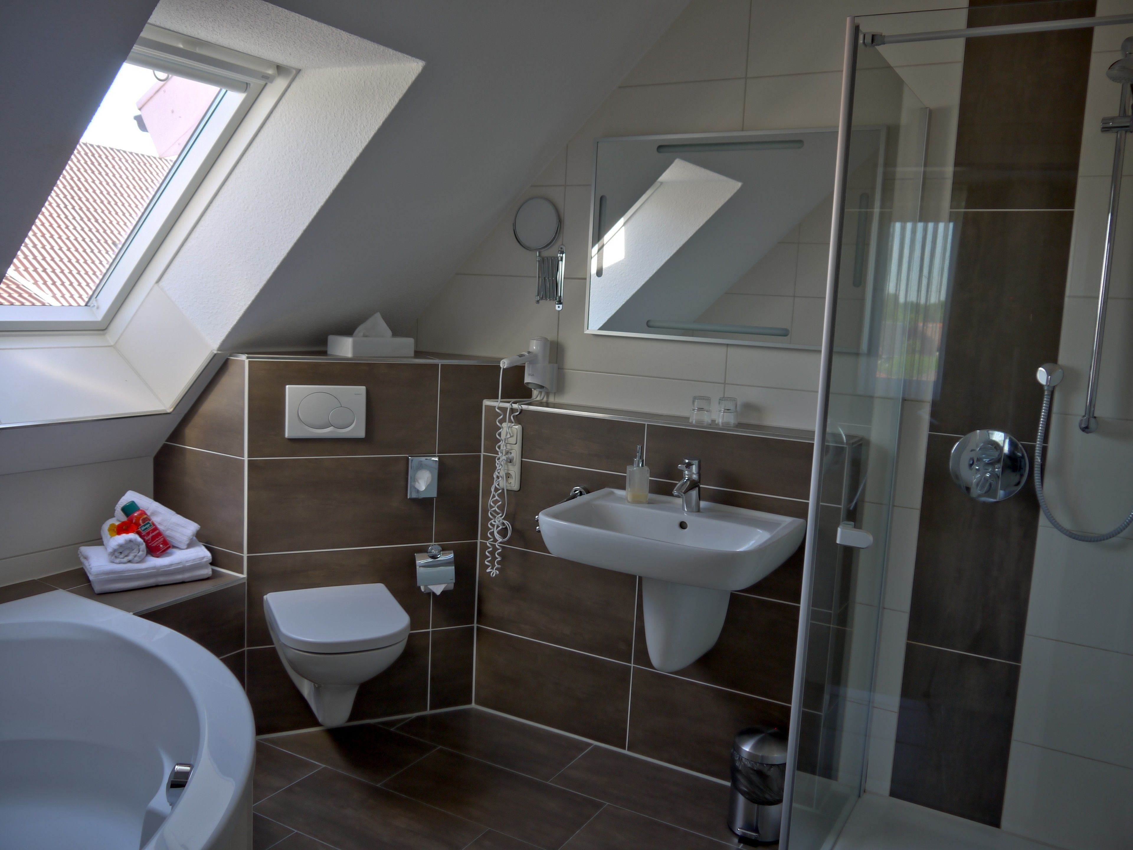 superior double room | bathroom | shower, free toiletries, hair dryer, towels