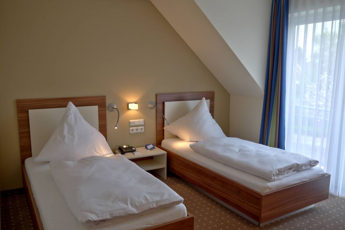 superior double room | living area | lcd tv