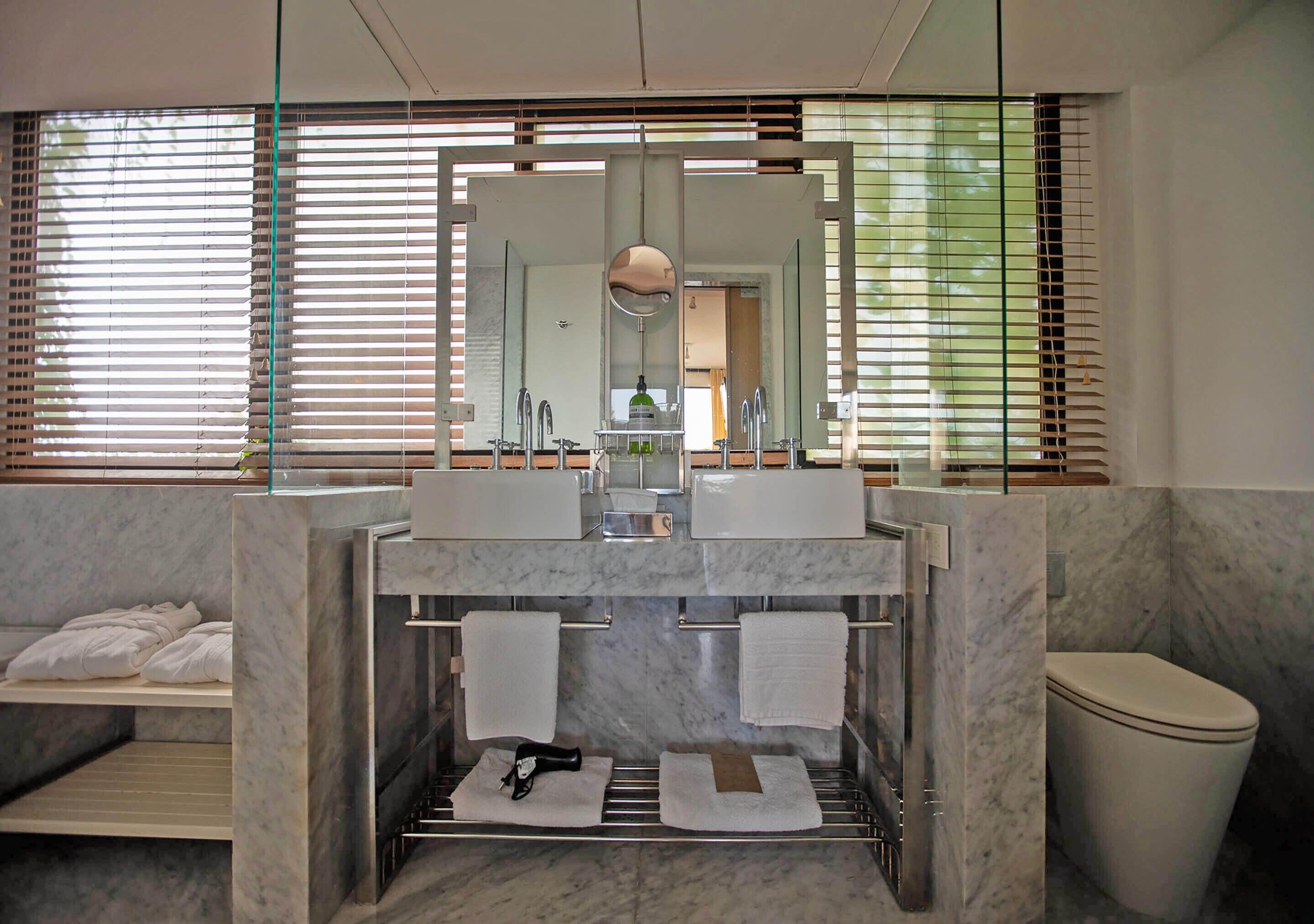 suite | bathroom | hair dryer, bidet, towels