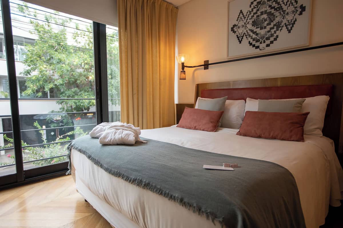 Kamar Deluks | 1 kamar tidur, seprai premium, selimut bulu angsa, dan minibar