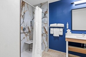 Room, 1 King Bed with Sofa bed, Accessible (Mobility & Hearing, 3x3 Shower) | Bathroom | Hair dryer, towels, soap, shampoo