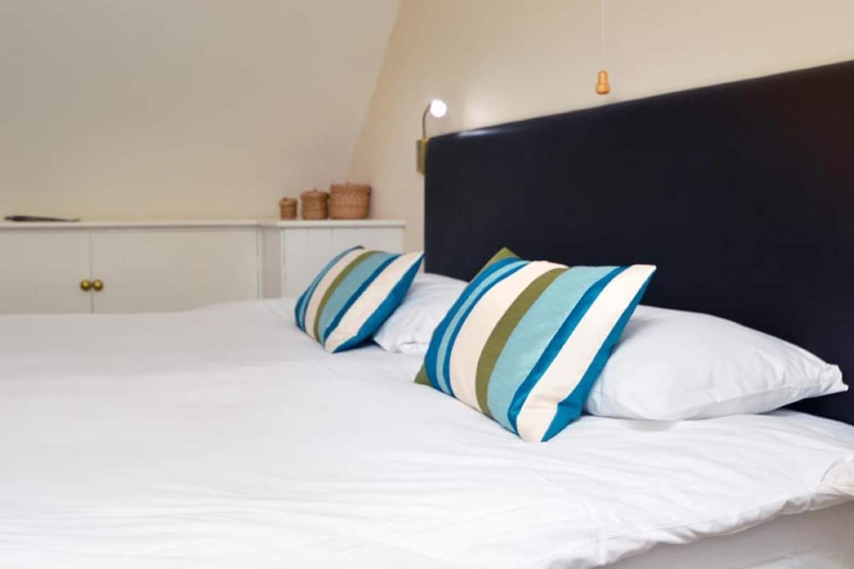 Iron/ironing board, travel cot, rollaway beds, free WiFi