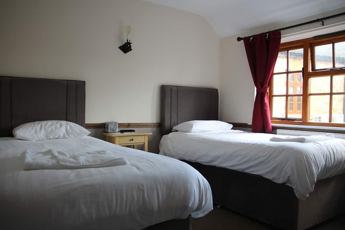 Iron/ironing board, travel cot, rollaway beds, free WiFi