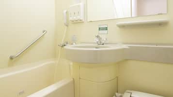 Combined shower/tub, free toiletries, hair dryer, slippers