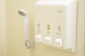 Regadera en el baño