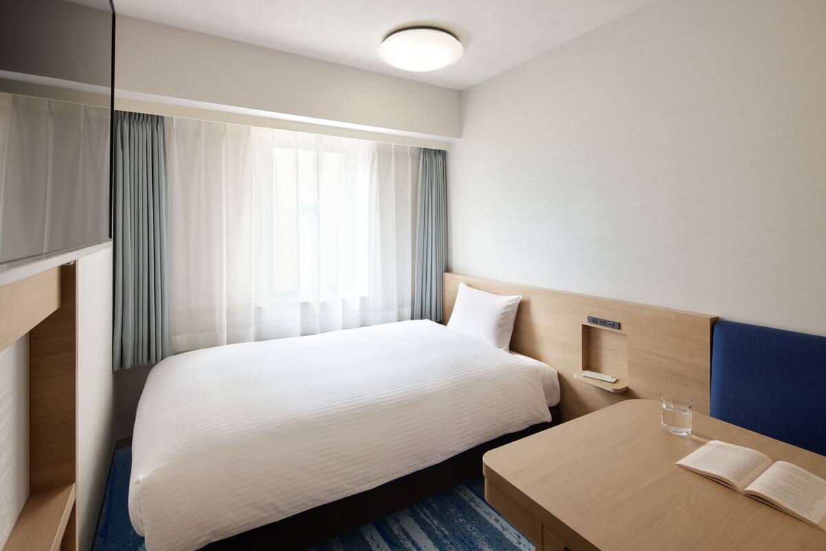 Desk, blackout curtains, free WiFi, bed sheets