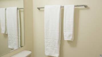 Combined shower/tub, free toiletries, hair dryer, slippers