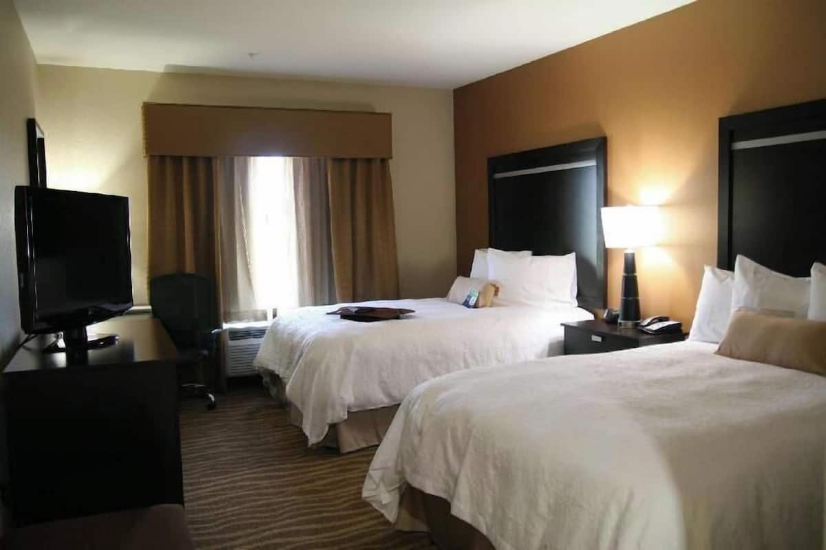 Hypo-allergenic bedding, down comforters, pillowtop beds, in-room safe