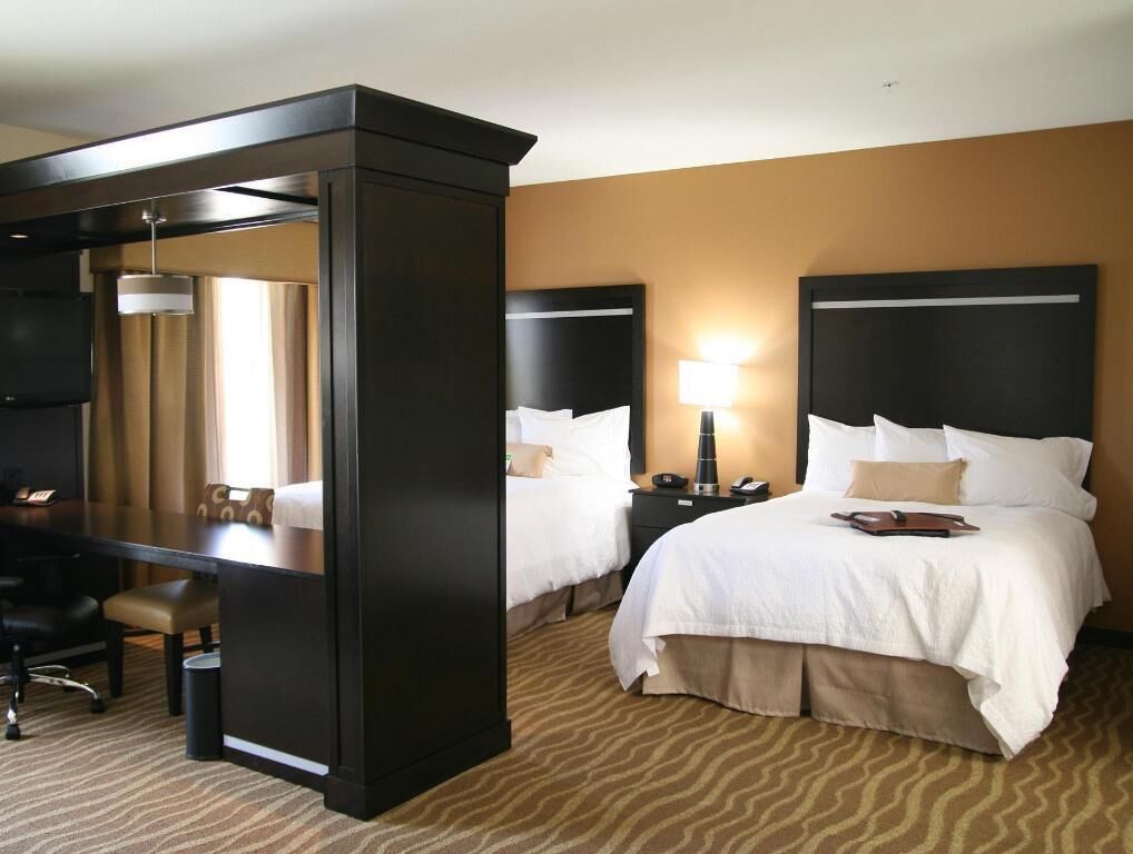 Hypo-allergenic bedding, down comforters, pillowtop beds, in-room safe