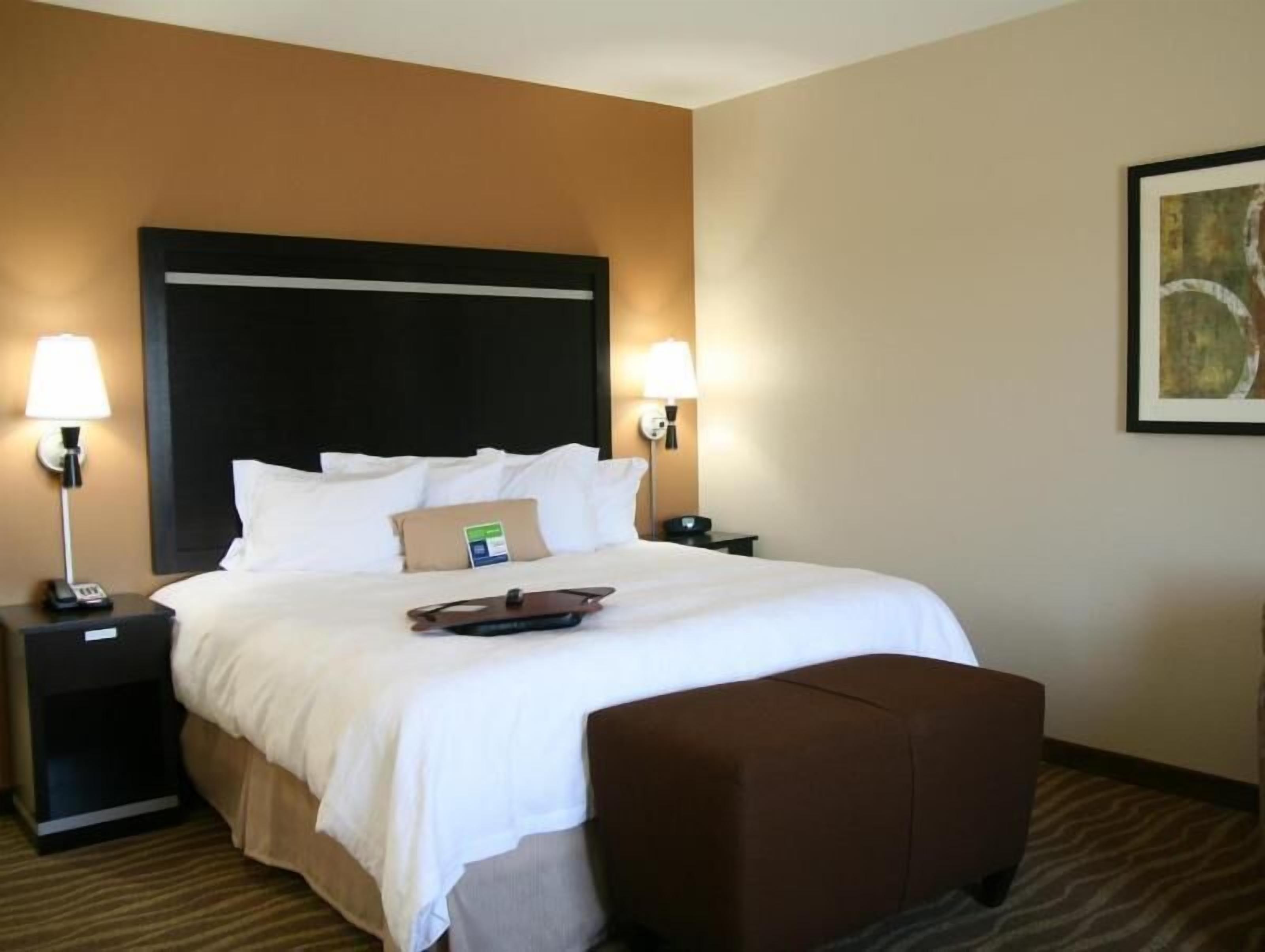 Hypo-allergenic bedding, down comforters, pillowtop beds, in-room safe