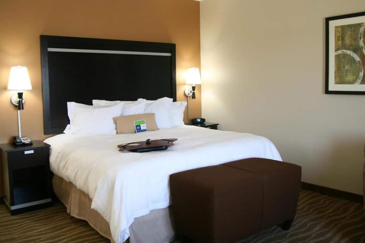 Hypo-allergenic bedding, down comforters, pillowtop beds, in-room safe