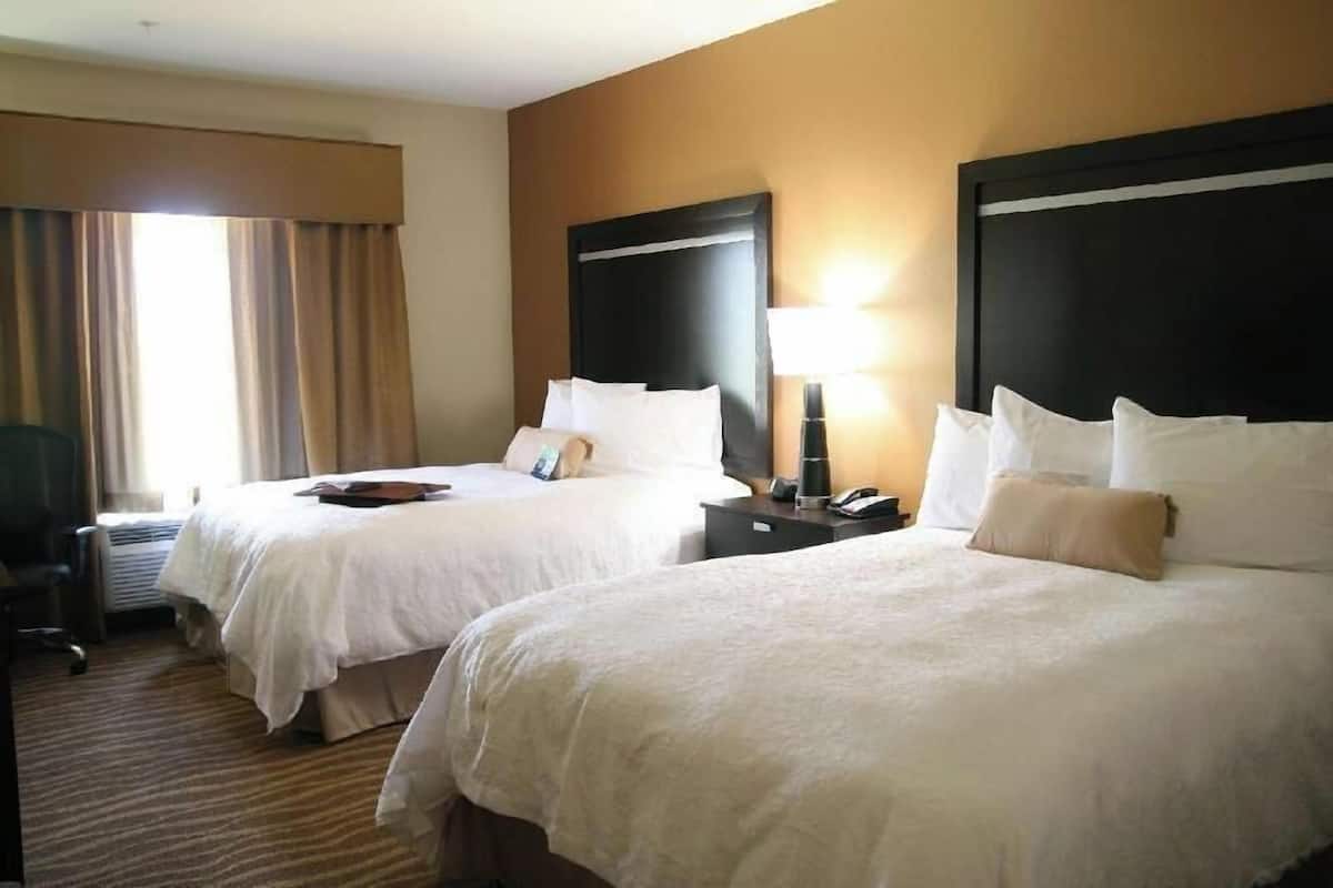 Hypo-allergenic bedding, down comforters, pillowtop beds, in-room safe