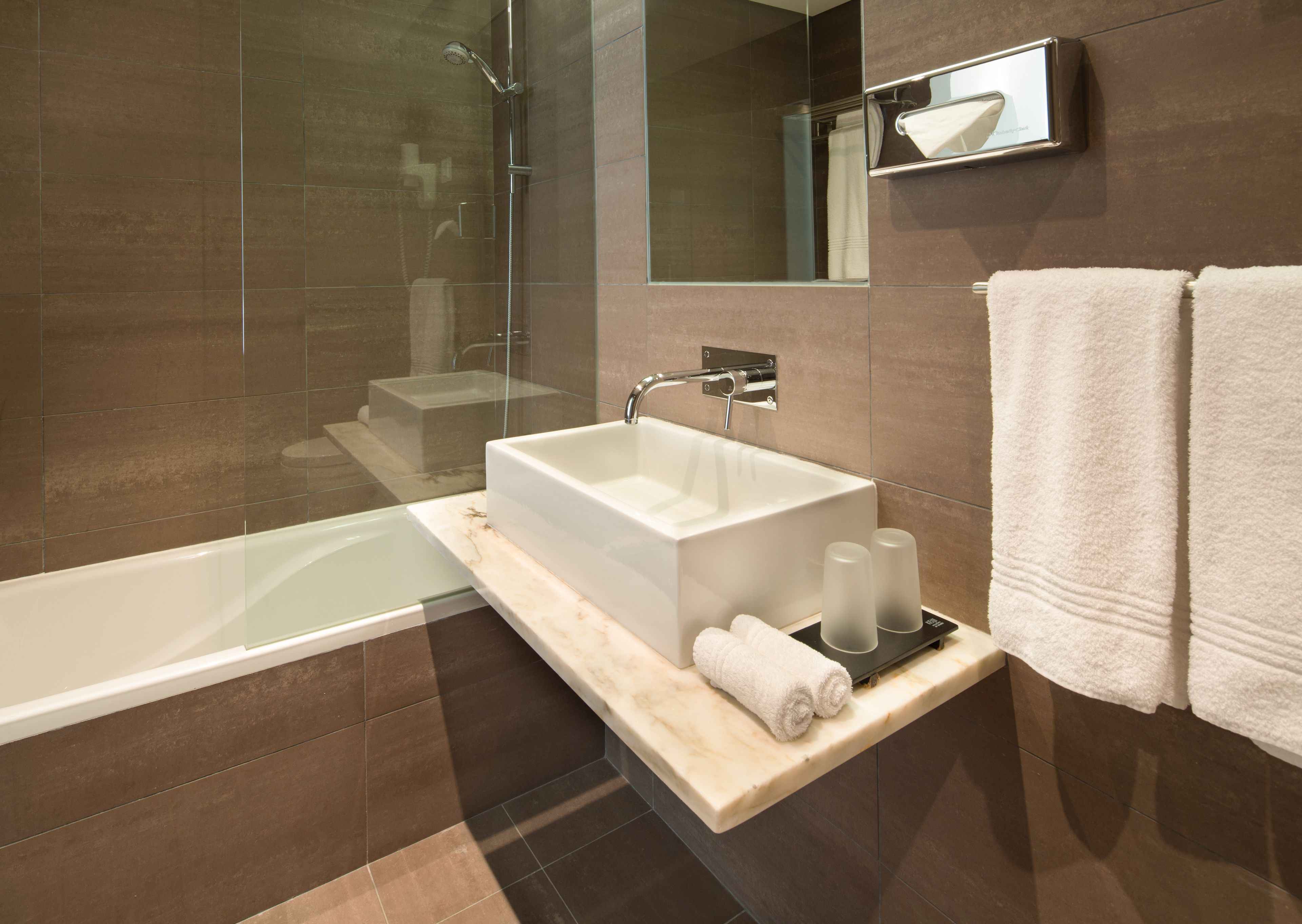 combined shower/bathtub, free toiletries, hair dryer, bathrobes