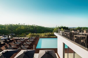 2 outdoor pools, open 9:00 AM to 7:00 PM, pool umbrellas, sun loungers