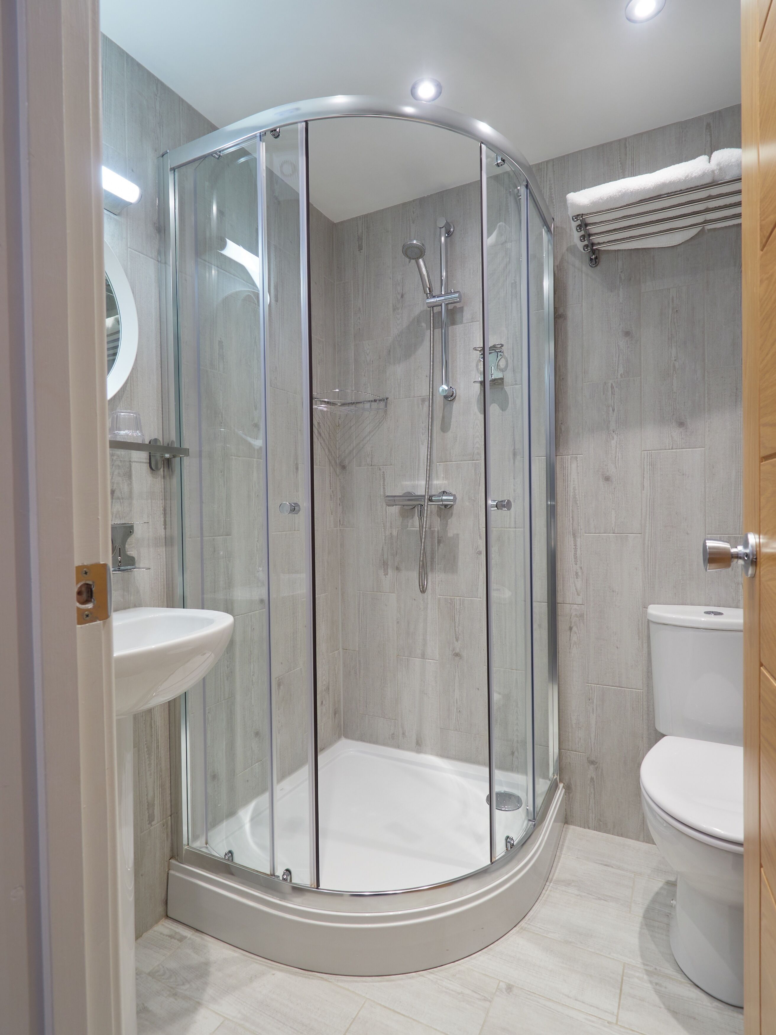 shower, free toiletries, hair dryer, towels