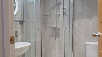 Shower, free toiletries, hair dryer, towels