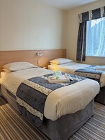 Standard Twin Room | Individually decorated, iron/ironing board, free WiFi, bed sheets