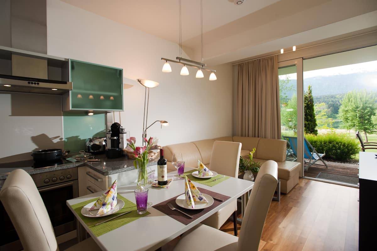 junior apartment, 1 bedroom, balcony, lake view | living area | flat-screen tv