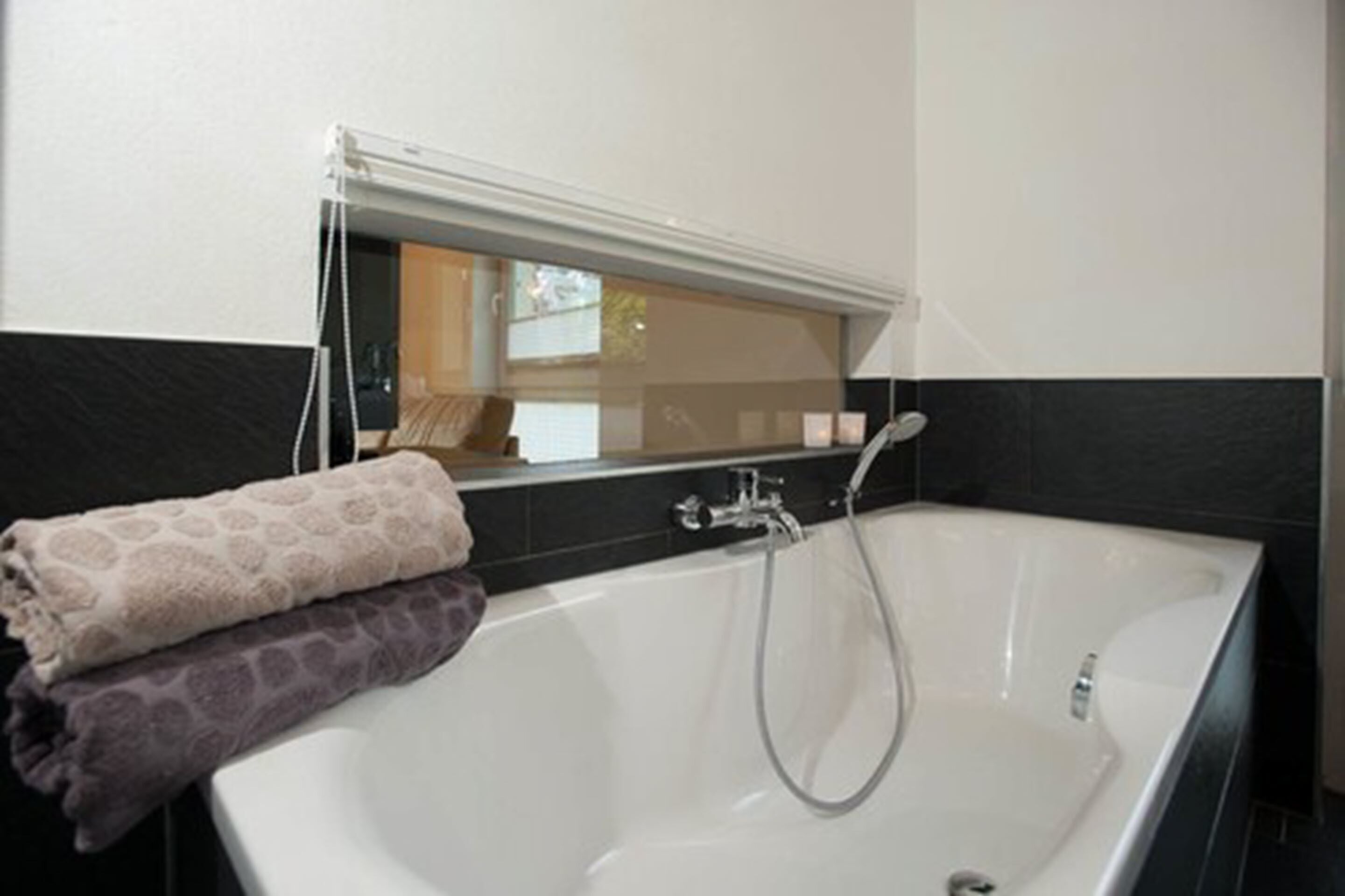 junior apartment, 1 bedroom, balcony, lake view | deep-soaking bathtub