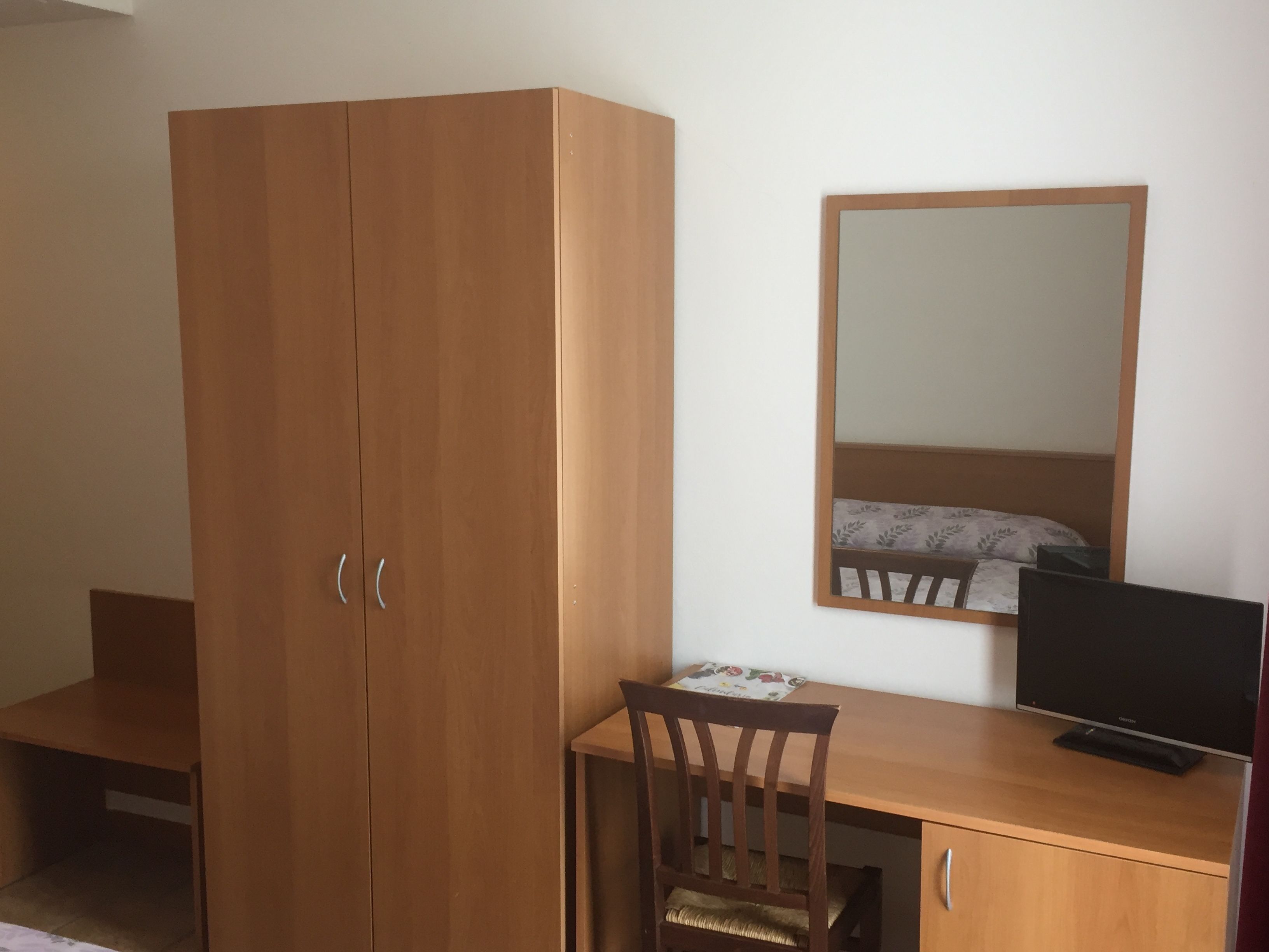 single room | in-room safe, desk, blackout curtains, iron/ironing board