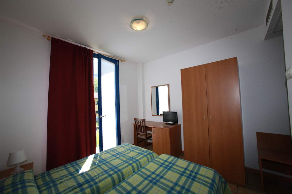 double room | in-room safe, desk, blackout curtains, iron/ironing board