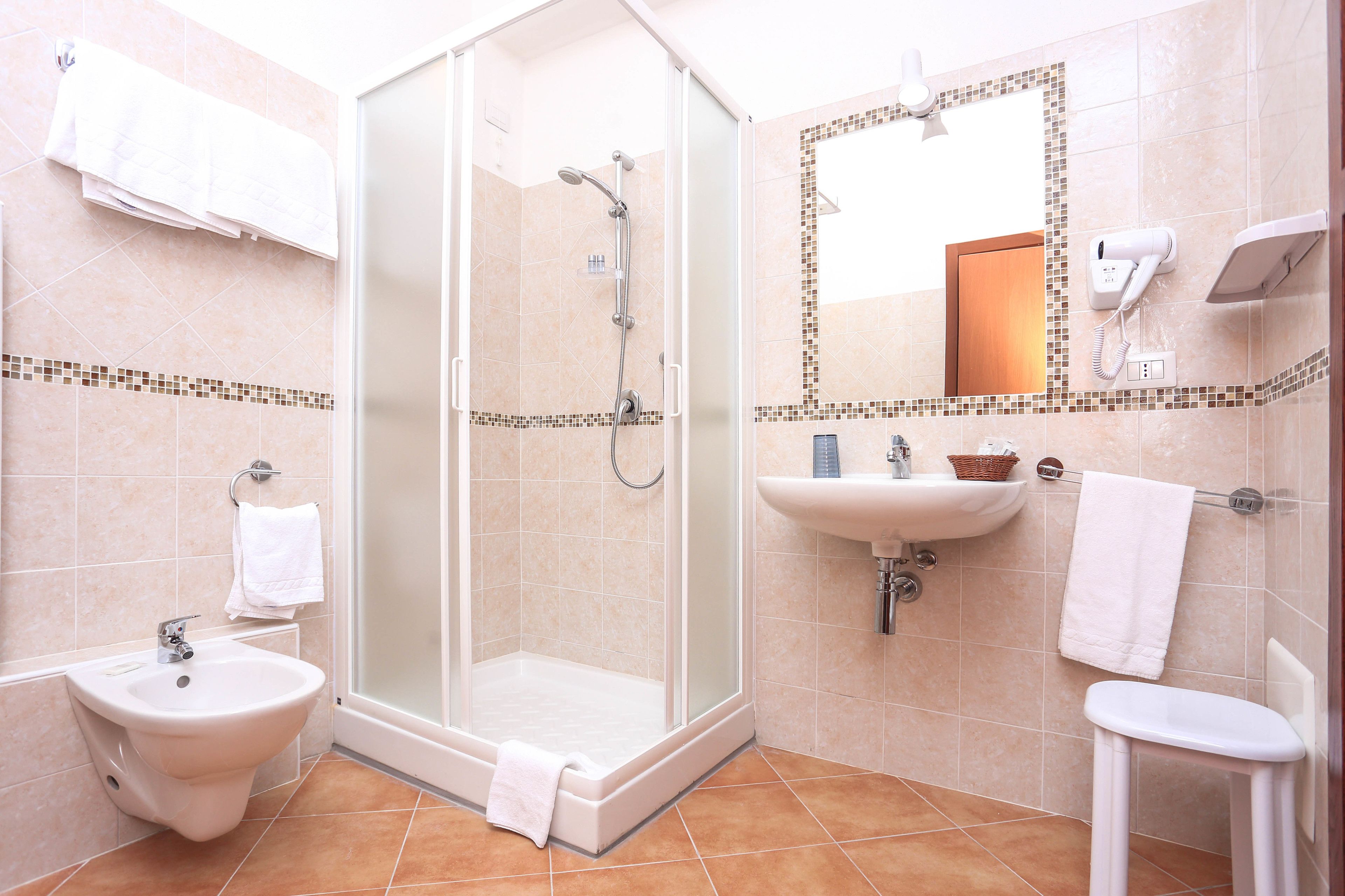 superior triple room, sea view | bathroom | shower, free toiletries, hair dryer, bidet
