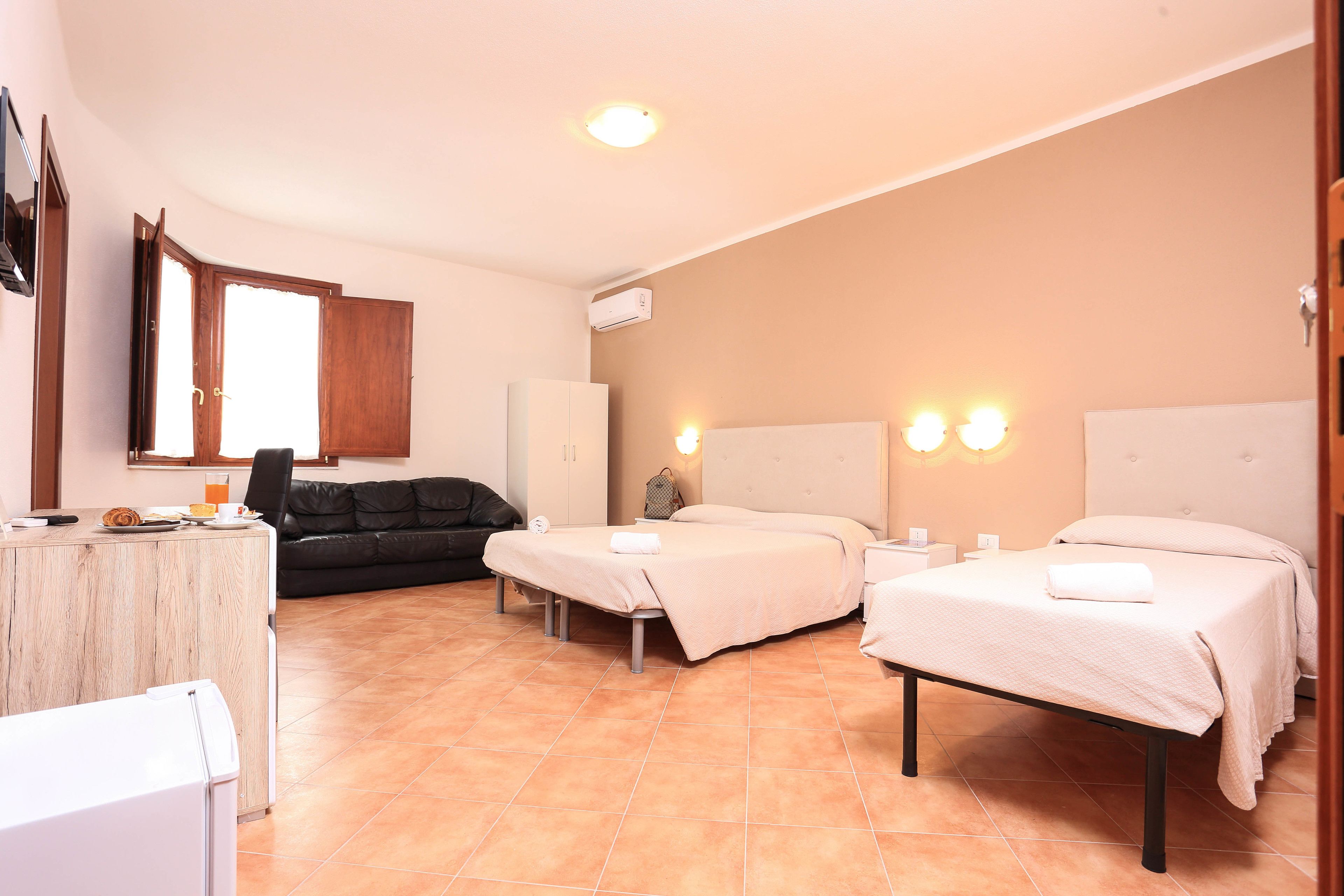 superior triple room, sea view | 1 bedroom, minibar, in-room safe, desk