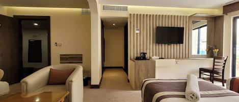 Triple Room | Free minibar, in-room safe, desk, laptop workspace