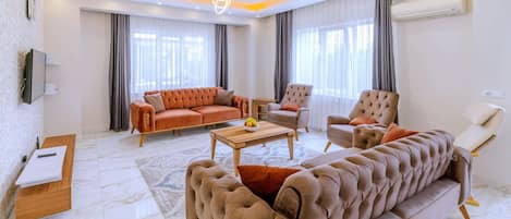 Vila, 2 quartos, sauna seca, vista para o jardim | Área de estar | TV LCD, DVD player, mesa de pingue-pongue