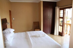 Desk, iron/ironing board, rollaway beds, bed sheets