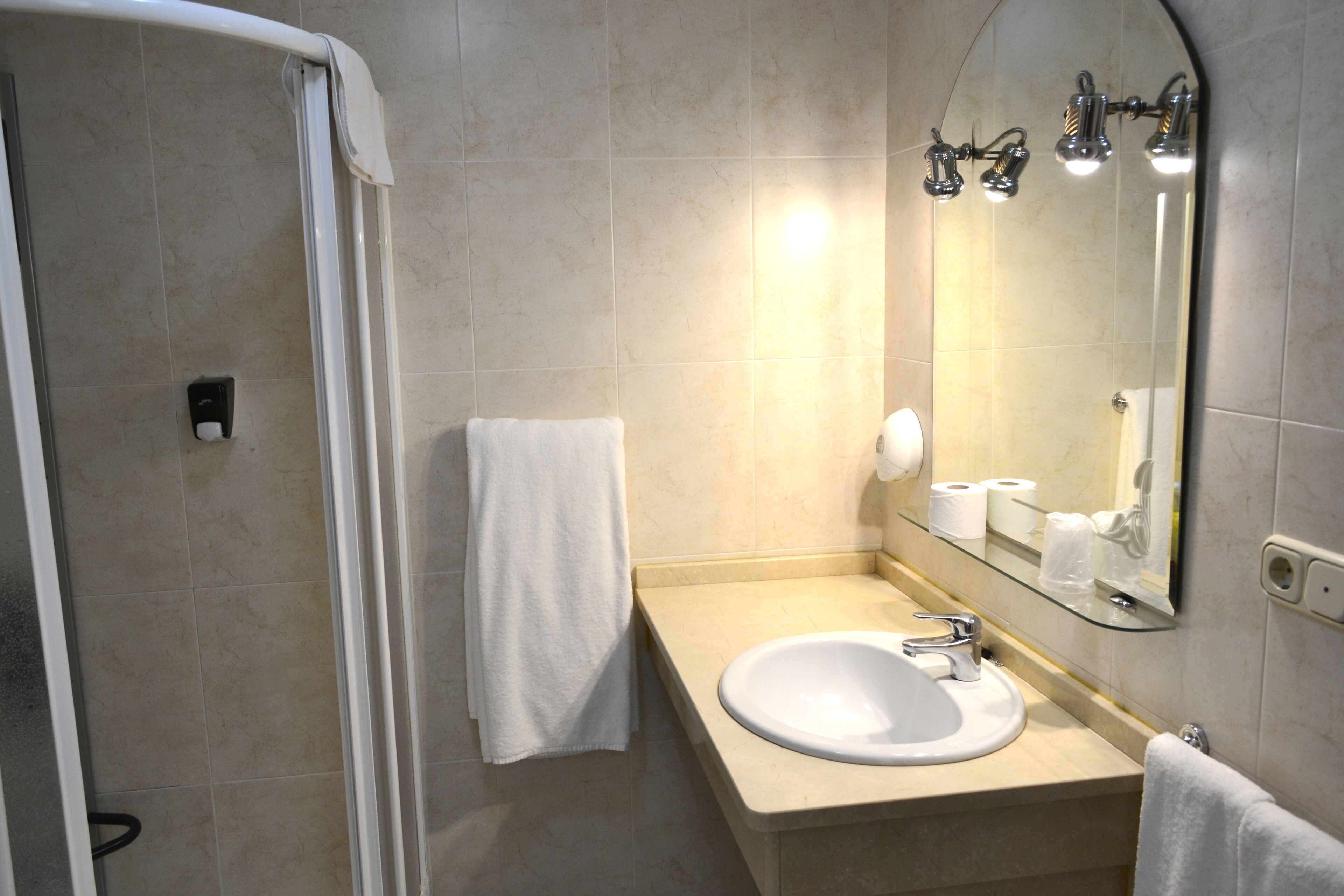 superior double room, partial sea view | bathroom | hair dryer, towels