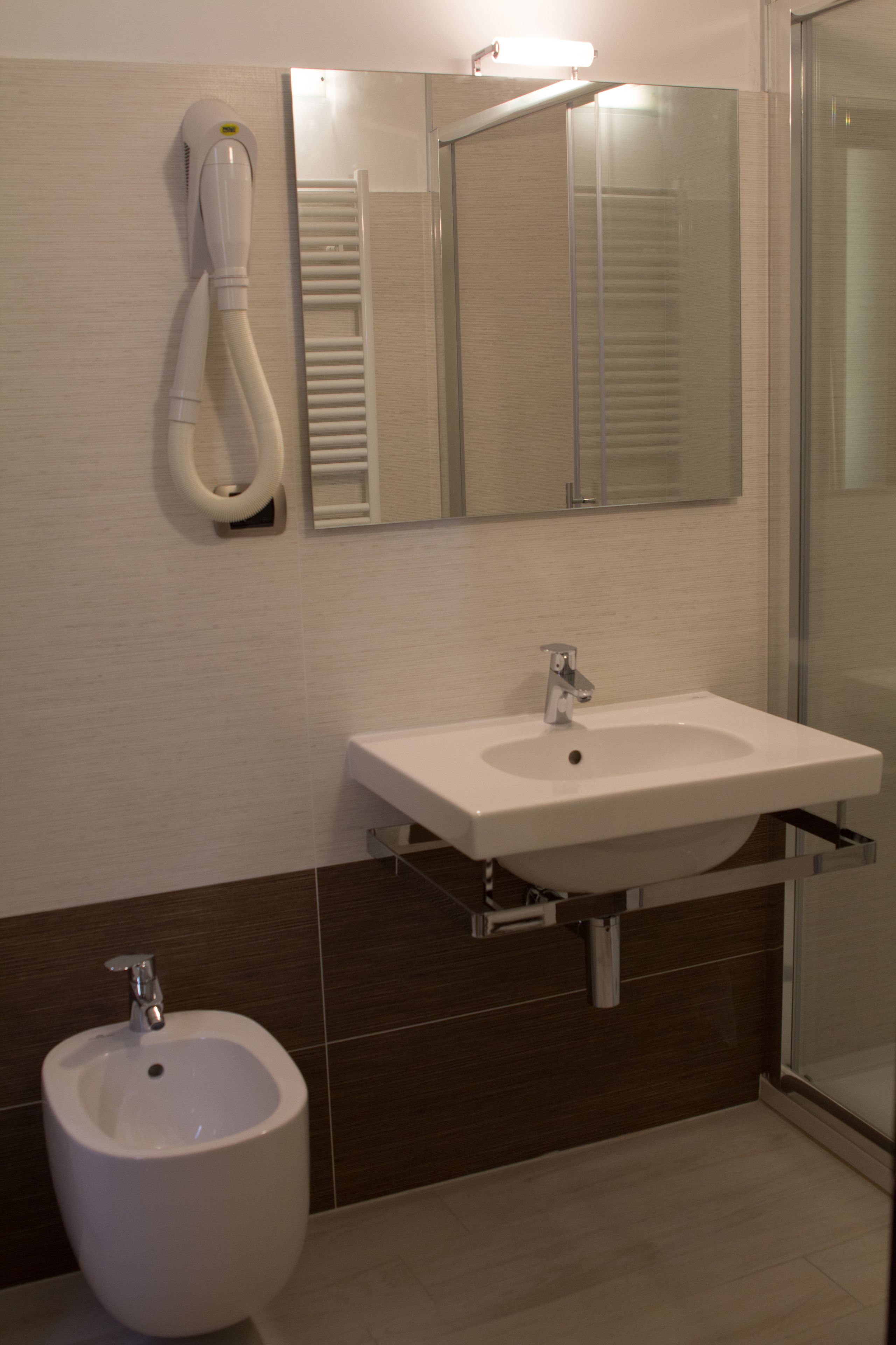 triple room | bathroom | rainfall showerhead, free toiletries, hair dryer, bidet