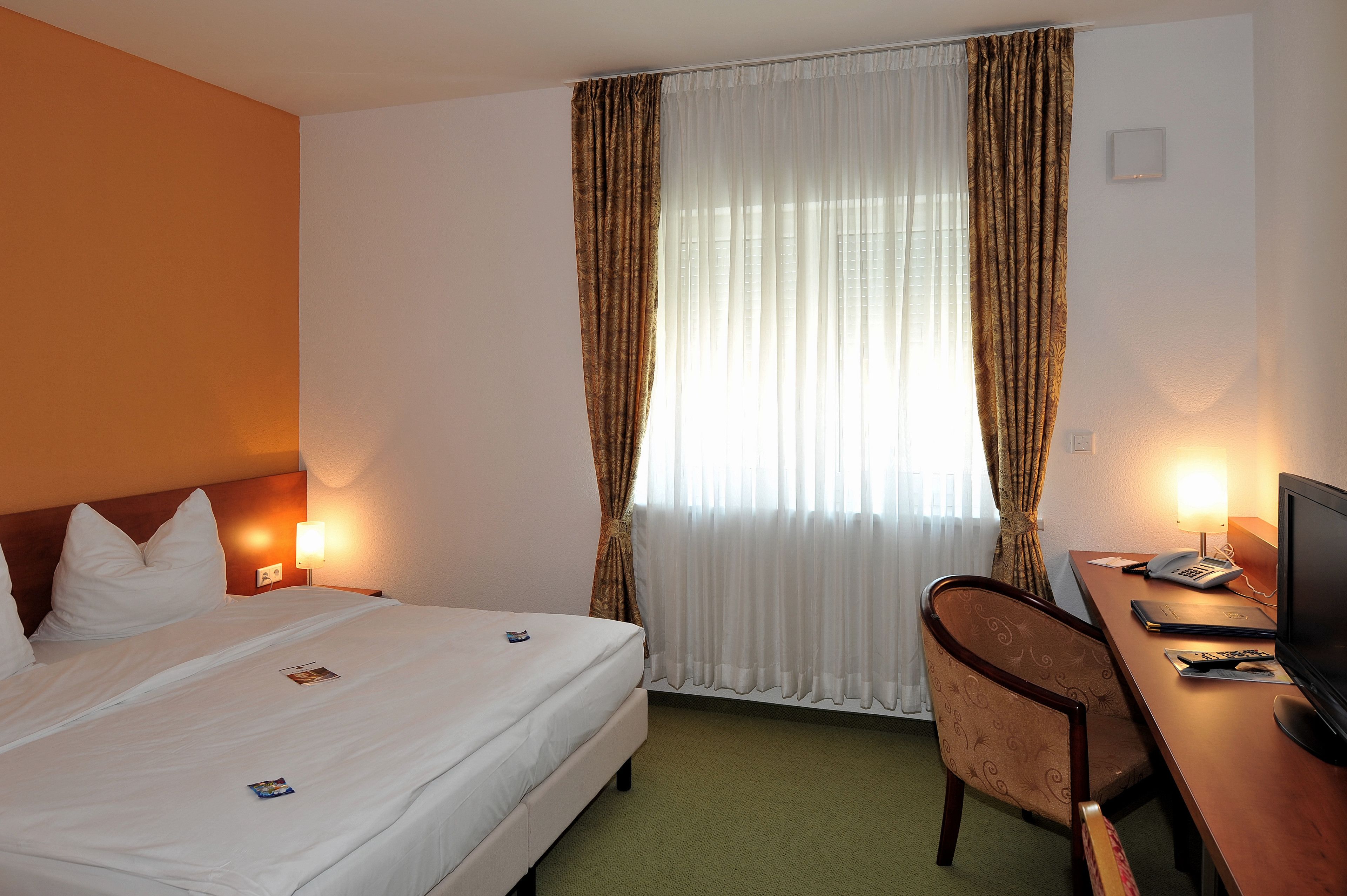 standard double room | desk, laptop workspace, blackout curtains, soundproofing