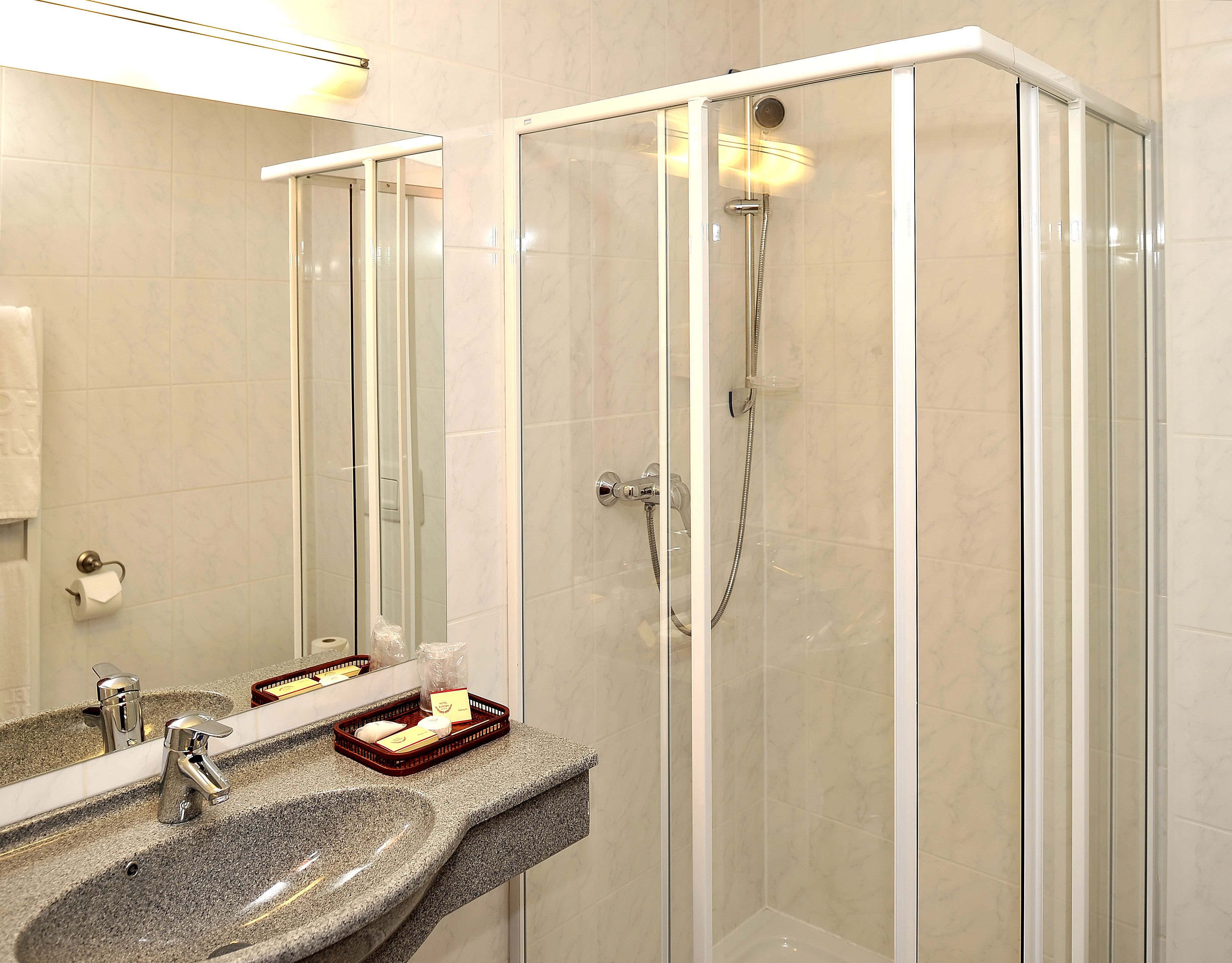 standard double room | bathroom | shower, hair dryer, towels
