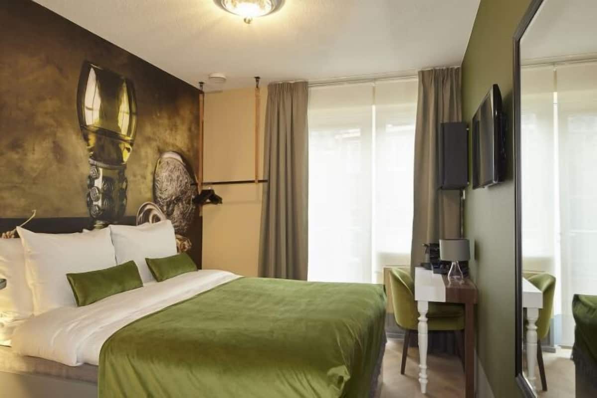 Premium bedding, pillow-top beds, free minibar items, in-room safe