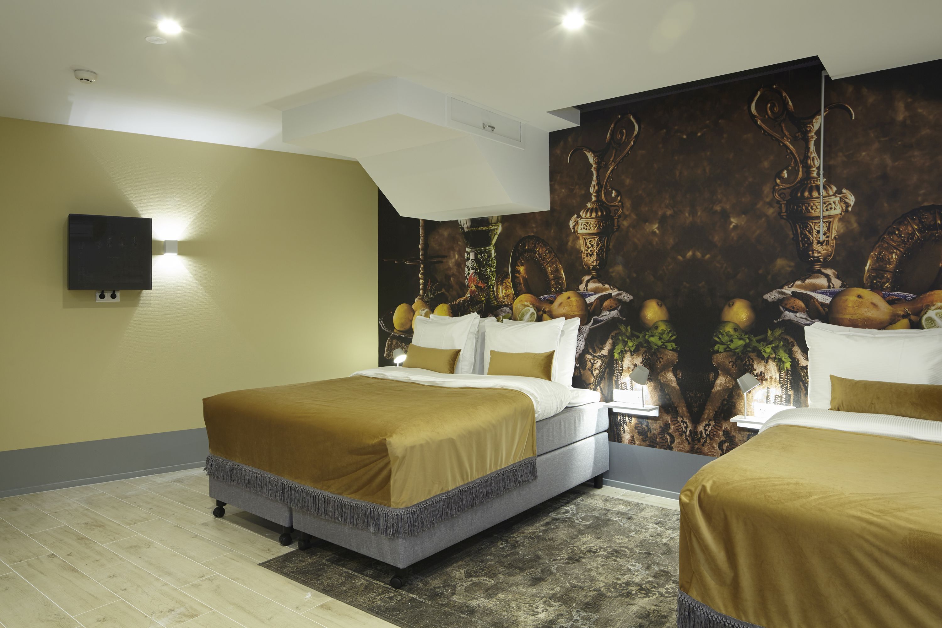 family room (basement) | premium bedding, pillow-top beds, free minibar items, in-room safe