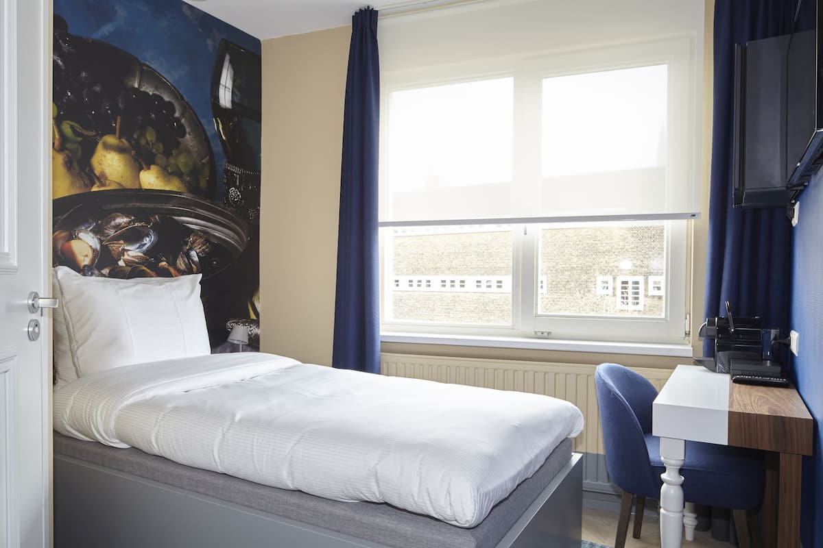 Single Room (Small) | Premium bedding, pillow-top beds, free minibar items, in-room safe