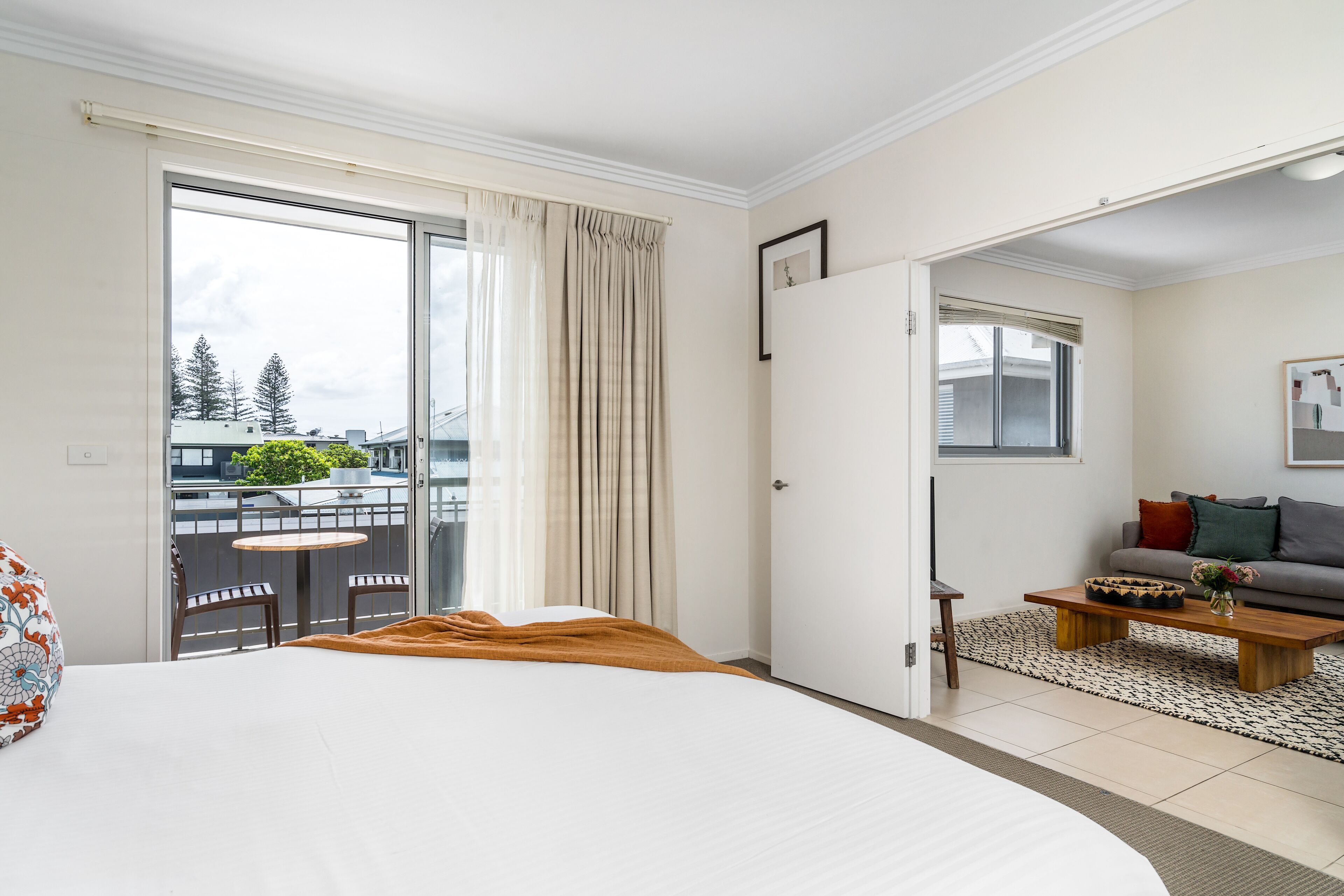 one bedroom deluxe apartment | living room | flat-screen tv