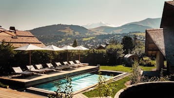 Indoor pool, outdoor pool, open 10:00 AM to 4:00 PM, pool loungers