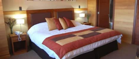 Ropa de cama de alta calidad y minibar
